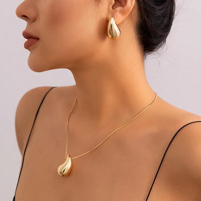 Fashionable Titanium Steel Hollow Water Drop Set Pendant Snake Bone Chain Earrings Plated With 18K Gold